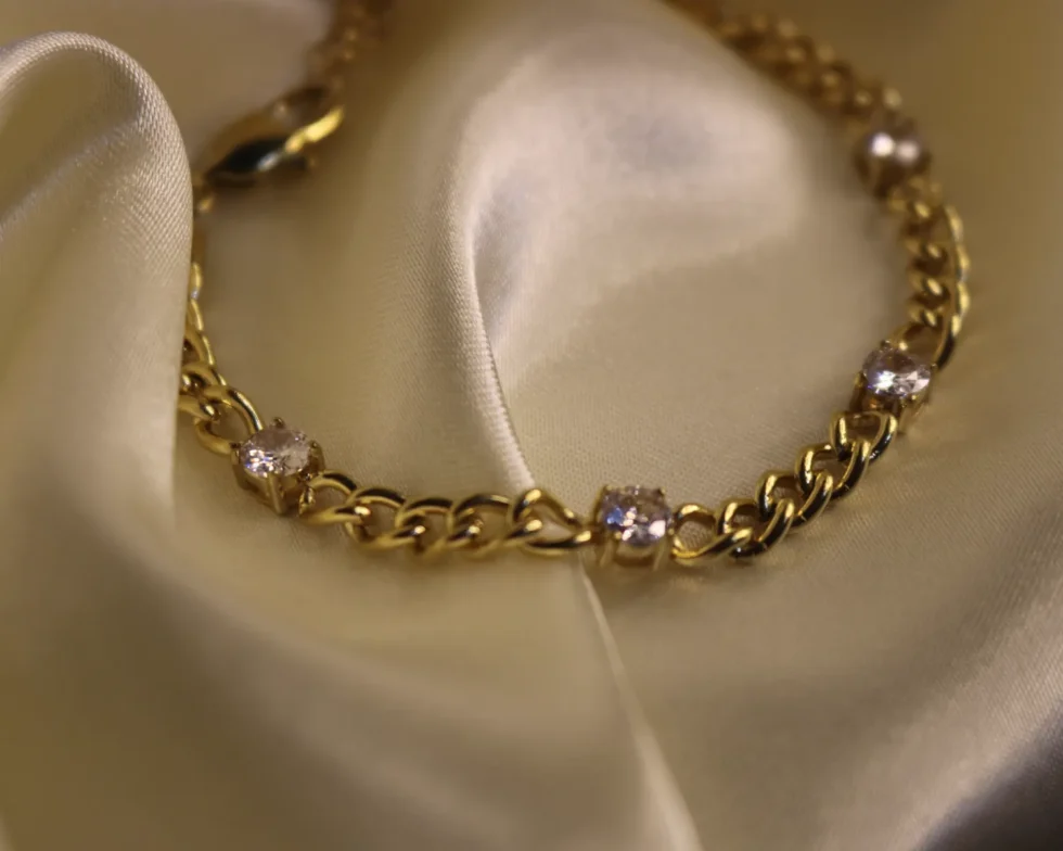 gold chain bracelet embellished with cubic zirconia