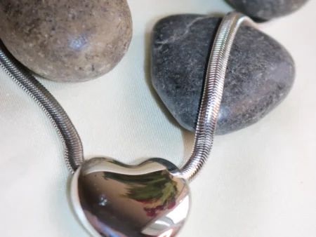 chunky silver heart pendant with herringbone pattern snake chain